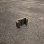 Universalus lygus kameros laikiklis