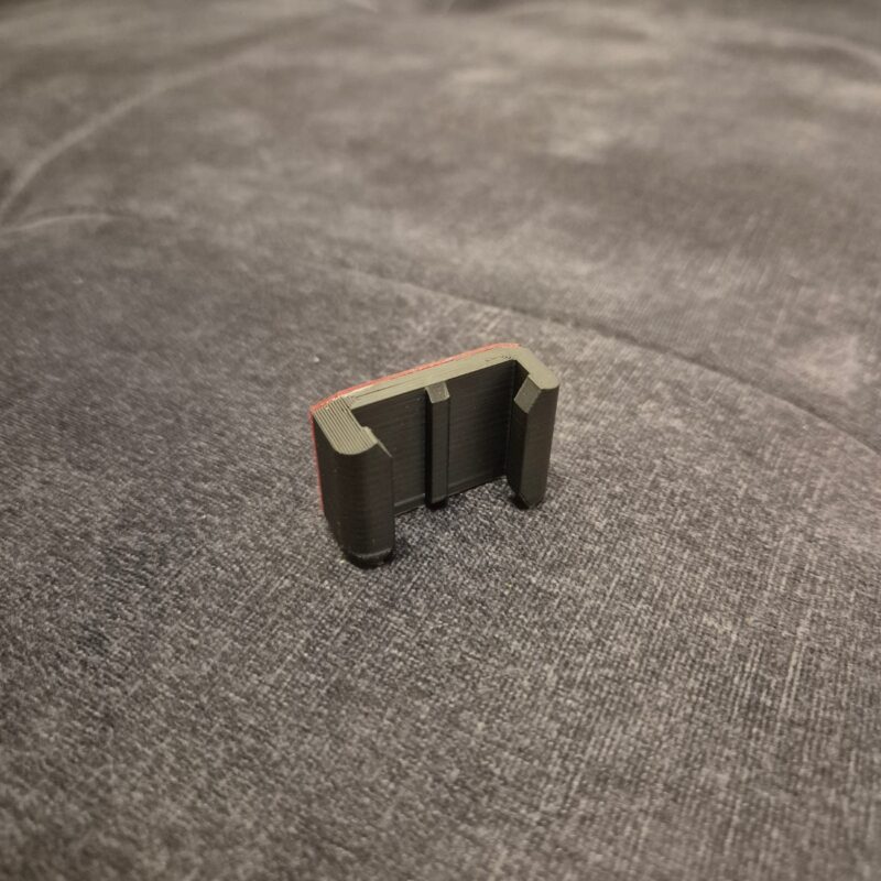 Universalus lygus kameros laikiklis